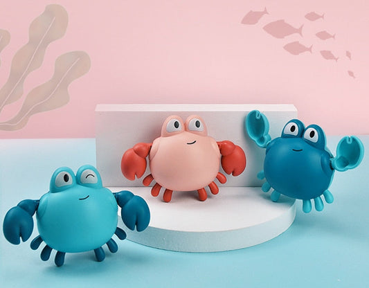 Wind-up bath toys, a turtle and a fish that swim across the tub