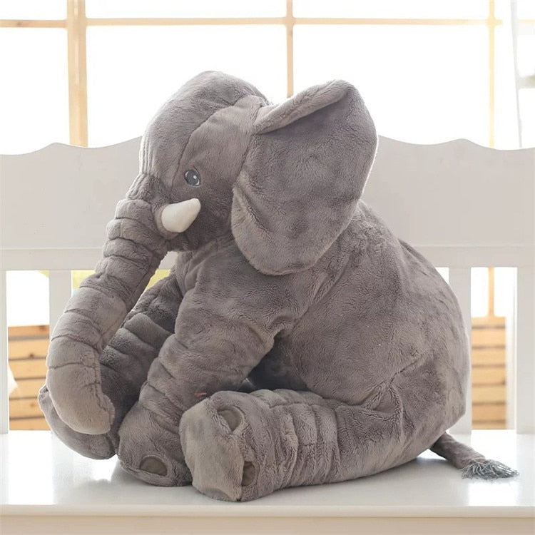 Giant plush elephant toy, large enough to lean on
