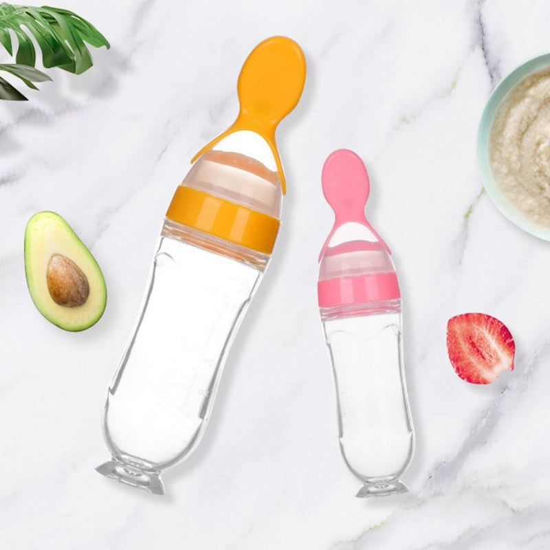 Silicone squeeze feeding bottle with spoon tip for baby puree
