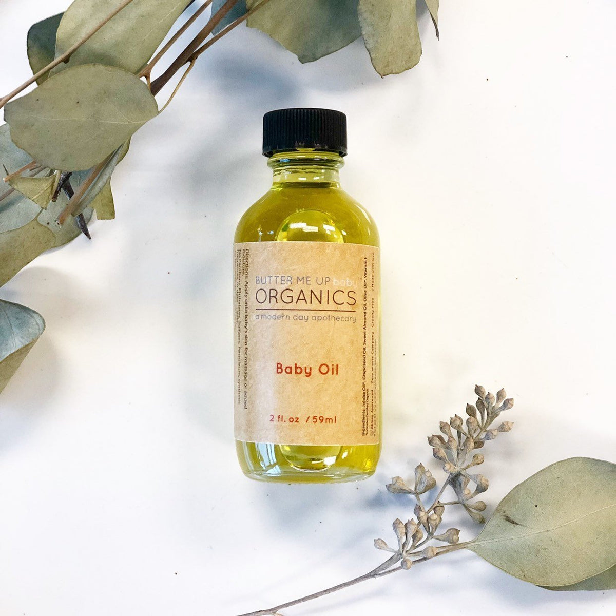2 oz glass bottle of fragrance-free organic baby massage oil