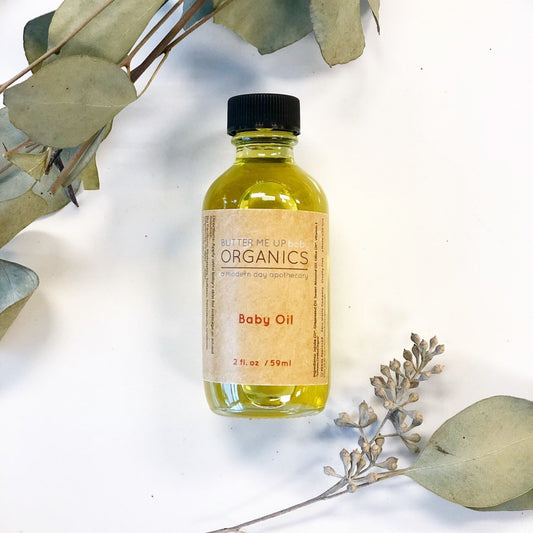 2 oz glass bottle of fragrance-free organic baby massage oil