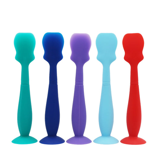 Silicone diaper cream applicator with suction base